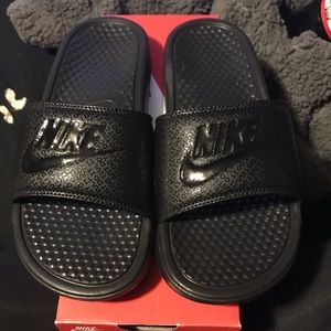 Black Nike slides